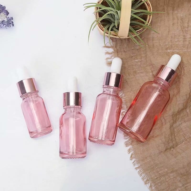 Różowa butelka szklana z pipetą | pojemnik na serum | olejek | różne pojemności, zdjecie stylizowane